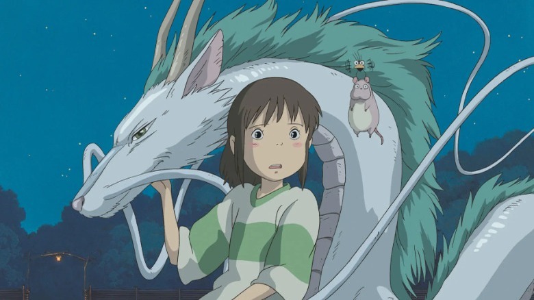 Spirited Away's Haku in dragon form, with Chihiro