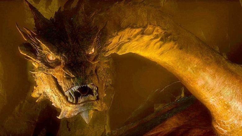 The Hobbit: The Desolation of Smaug's Smaug glowers while lit by gold