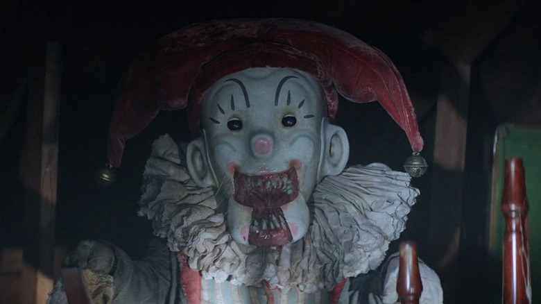 Krampus the jack in the box clown, jaw unhinged