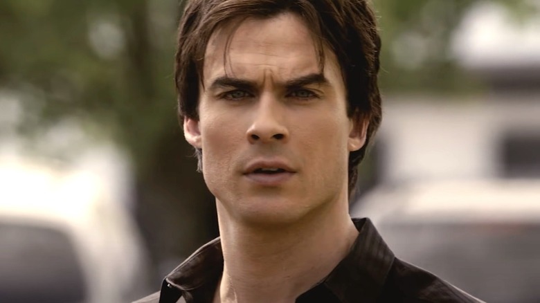 The Vampire Diaries Damon stares ahead