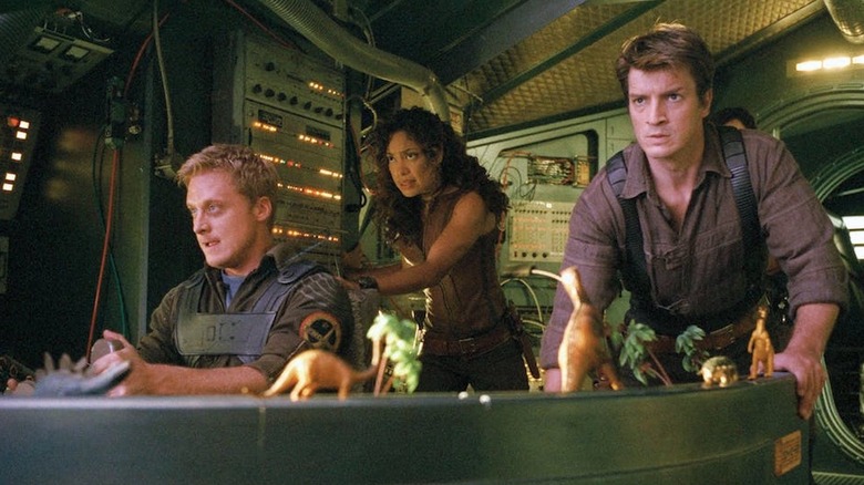 Alan Tudyk, Gina Torres, and Nathan Fillion as Wash, Zoey, and Mal in Serenity