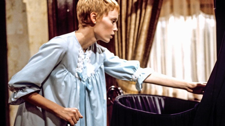 Mia Farrow holding a knife in Rosemary's Baby