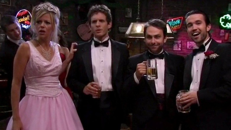 Dee Reynolds in a prom dress, Dennis Reynolds in a suit