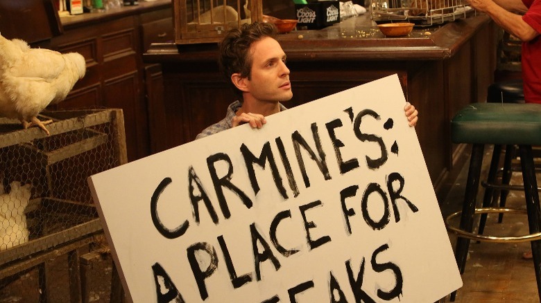 dennis reynolds protest sign chickens