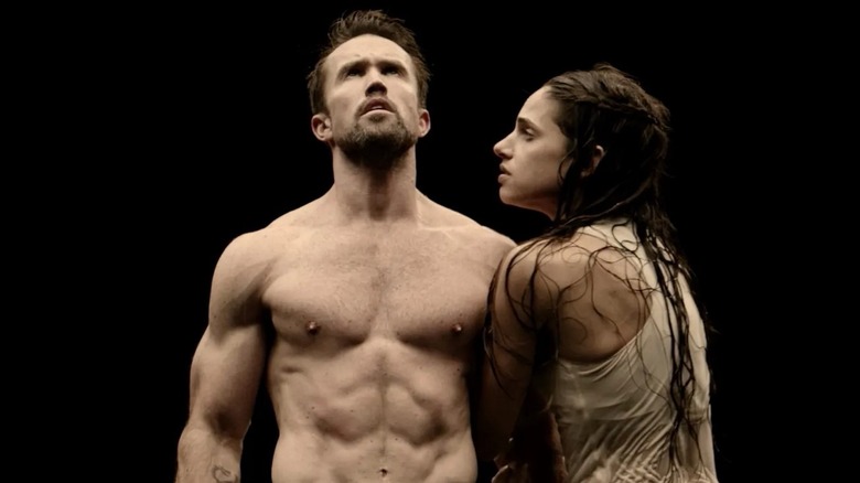 Mac shirtless with a female dancer