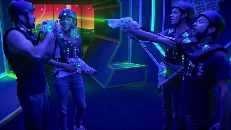 Mac, Dee Reynolds, Dennis Reynolds, and Charlie Kelly wearing laser tag gear