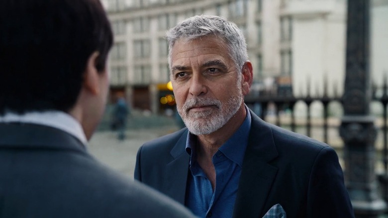 George Clooney's Bruce Wayne talking to Barry Allen in The Flash